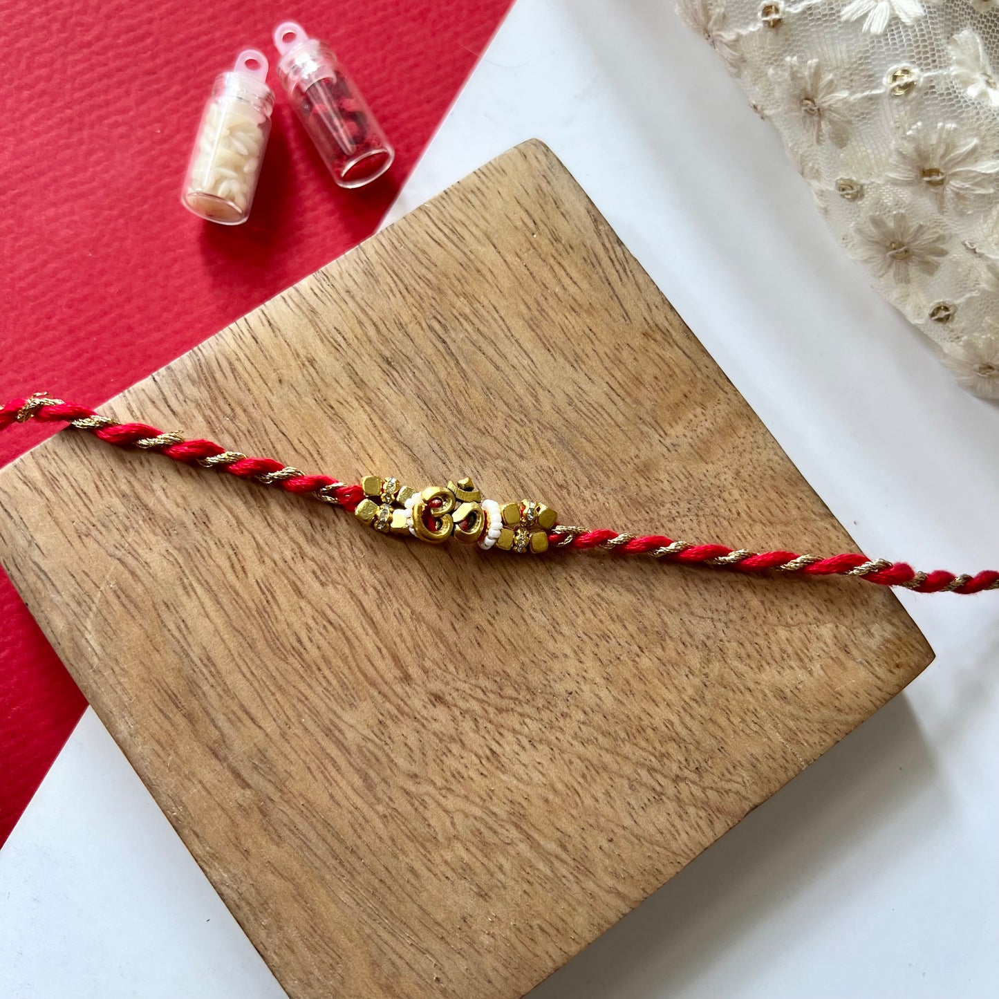 Om Bhai-Bhabhi Rakhi & Lumba Set