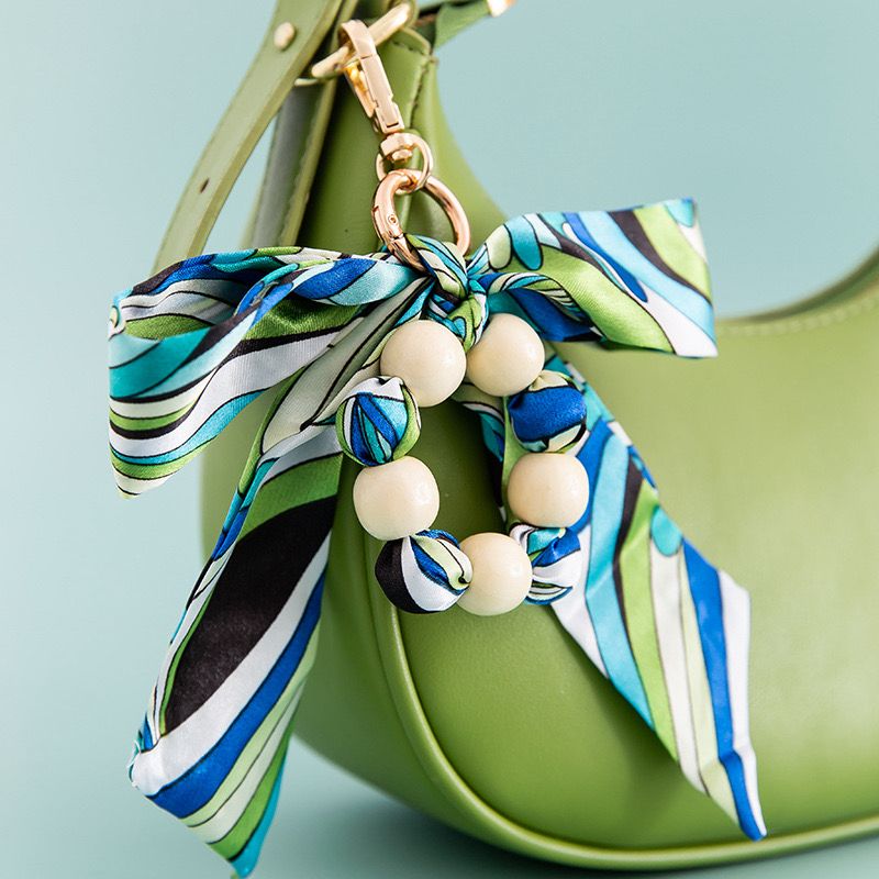 Tied Treasure Metal Bag Charm